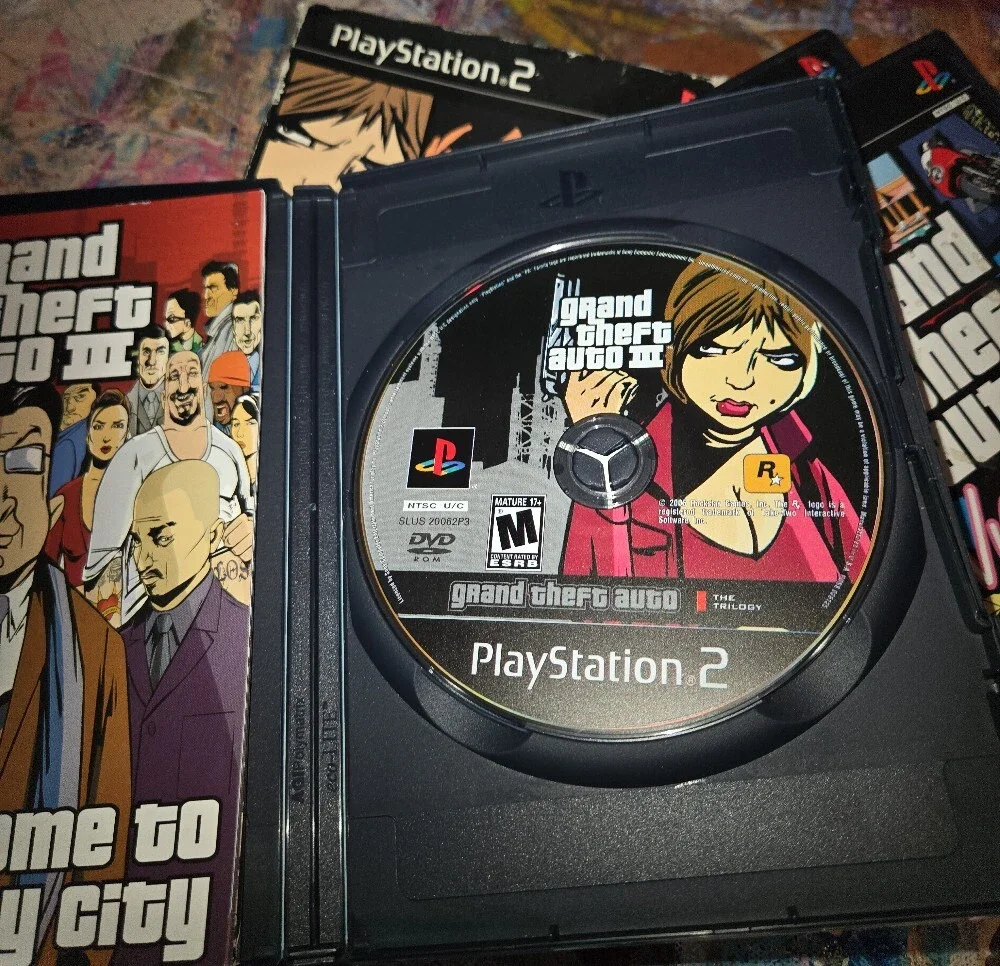 Sony PlayStation 2 Grand Theft Auto: The Trilogy — Black and Purple Cover